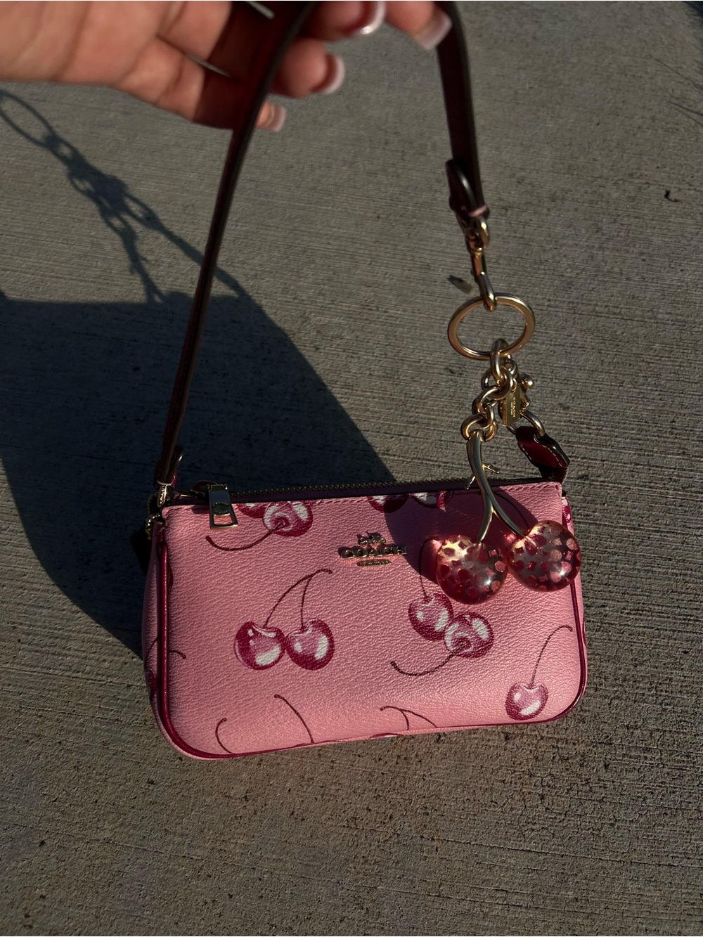 Coach Nolita 19 in Pink Cherry Print + Glitter Cherry Charm Set